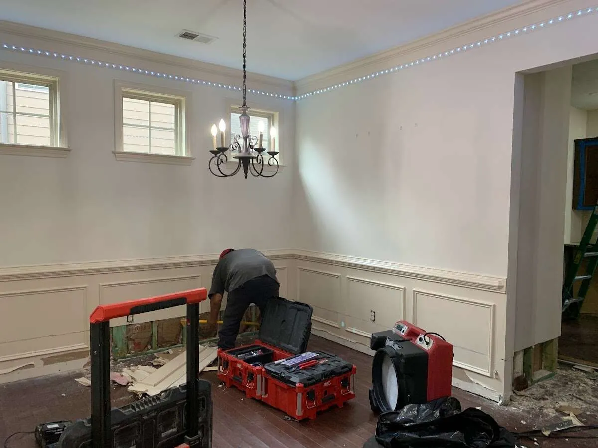 Restoration technician with professional equipment in Newport Beach